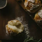 Rustic-style Kaiser rolls with a perfect balance of crust and fluff, topped with sesame and poppy seeds,