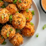 Crispy, bite-sized Bang Bang Salmon Bites coated in a creamy, sweet, and spicy sauce. Perfect for an easy dinner,