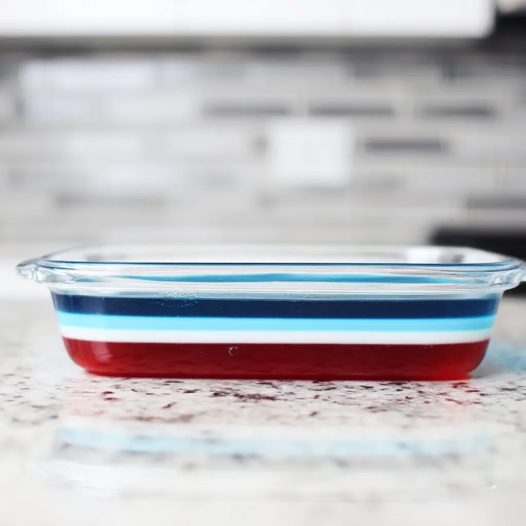 Whisk lifting creamy white gelatin made with sweetened condensed milk
